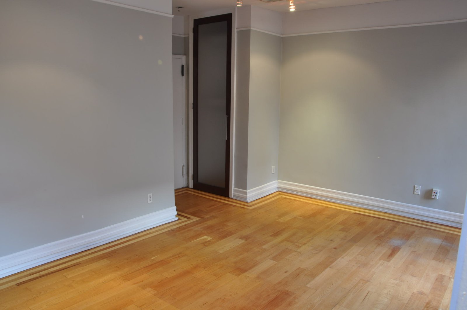 Sleeping area behind frosted-glass partition