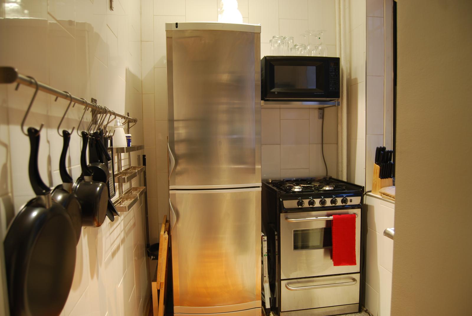 Separate kitchen with stainless appliances
